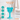 Turquoise silicone bear toothbrush with bristles, easy-grip handle, and upright base.