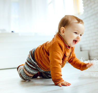a toddler playing on the floor