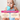 Turquoise silicone bear-head toothbrush teether in a baby’s mouth area.